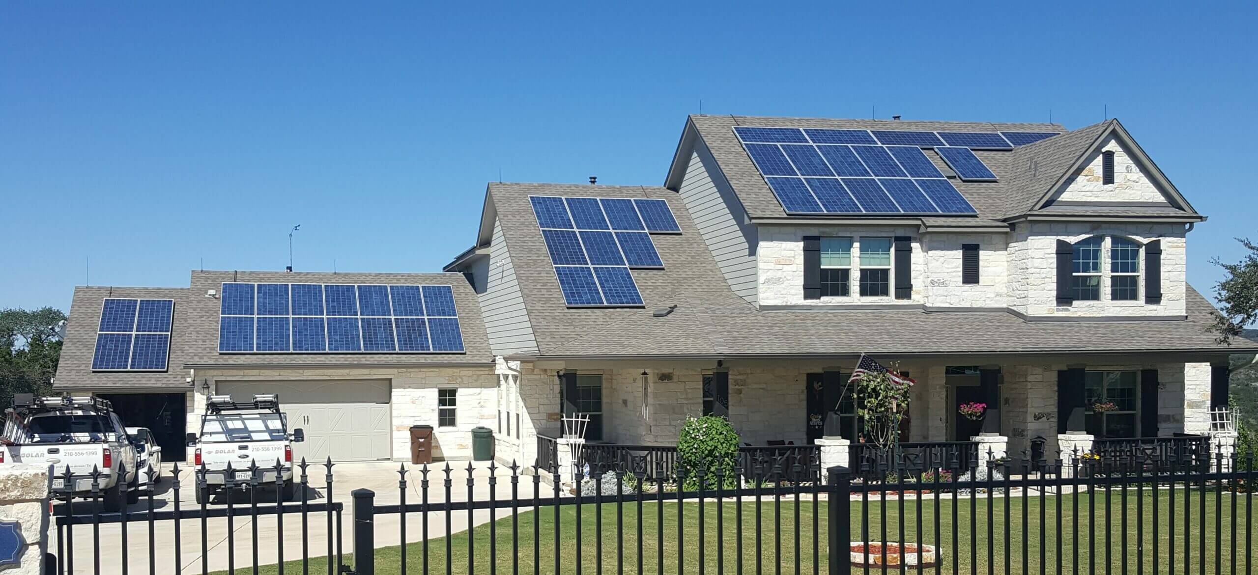 House with solar panels and PV modules on the roof