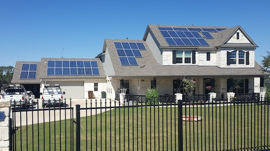 The Oesterle residence with solar panels and PV modules on the roof